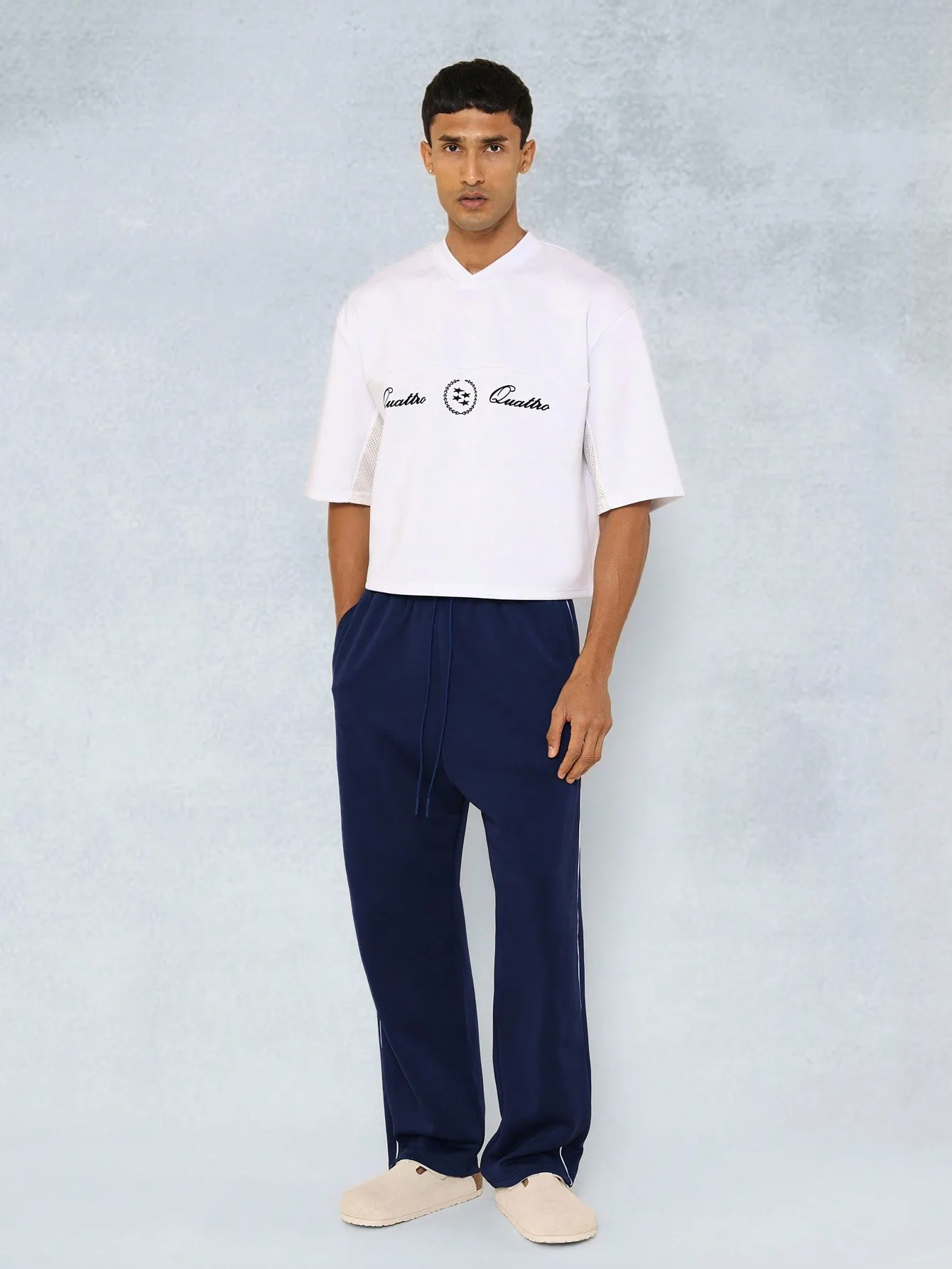 Crop V-Neck Hockey Tee With Graphic Print And Straight Fit Jogger With Contrast Piping 2 Piece Set