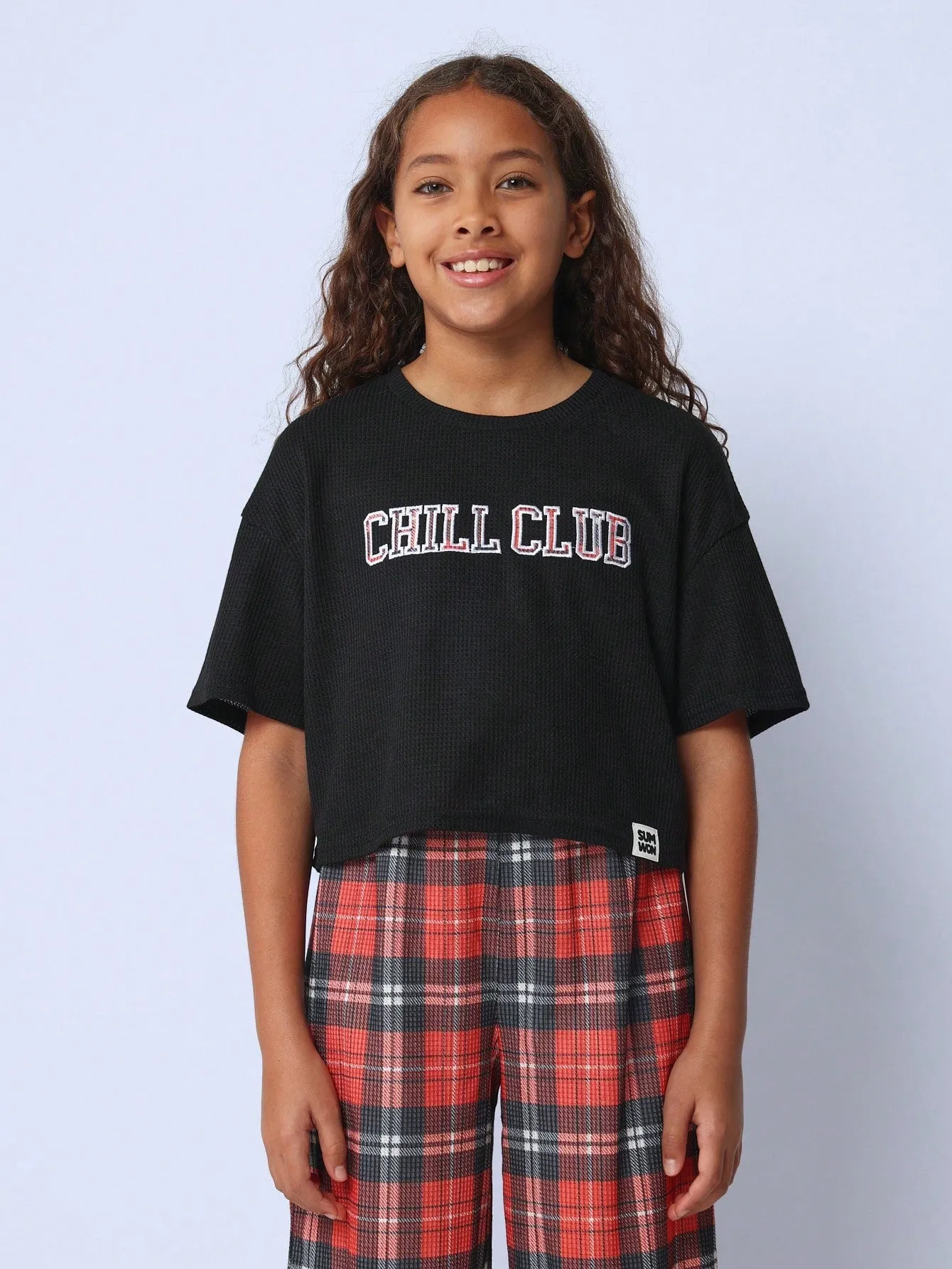 Tween Girls Comfy Crop Fit Short Sleeve Tee With Graphic Print And Check Jogger Pant 2 Piece Pyjama Set