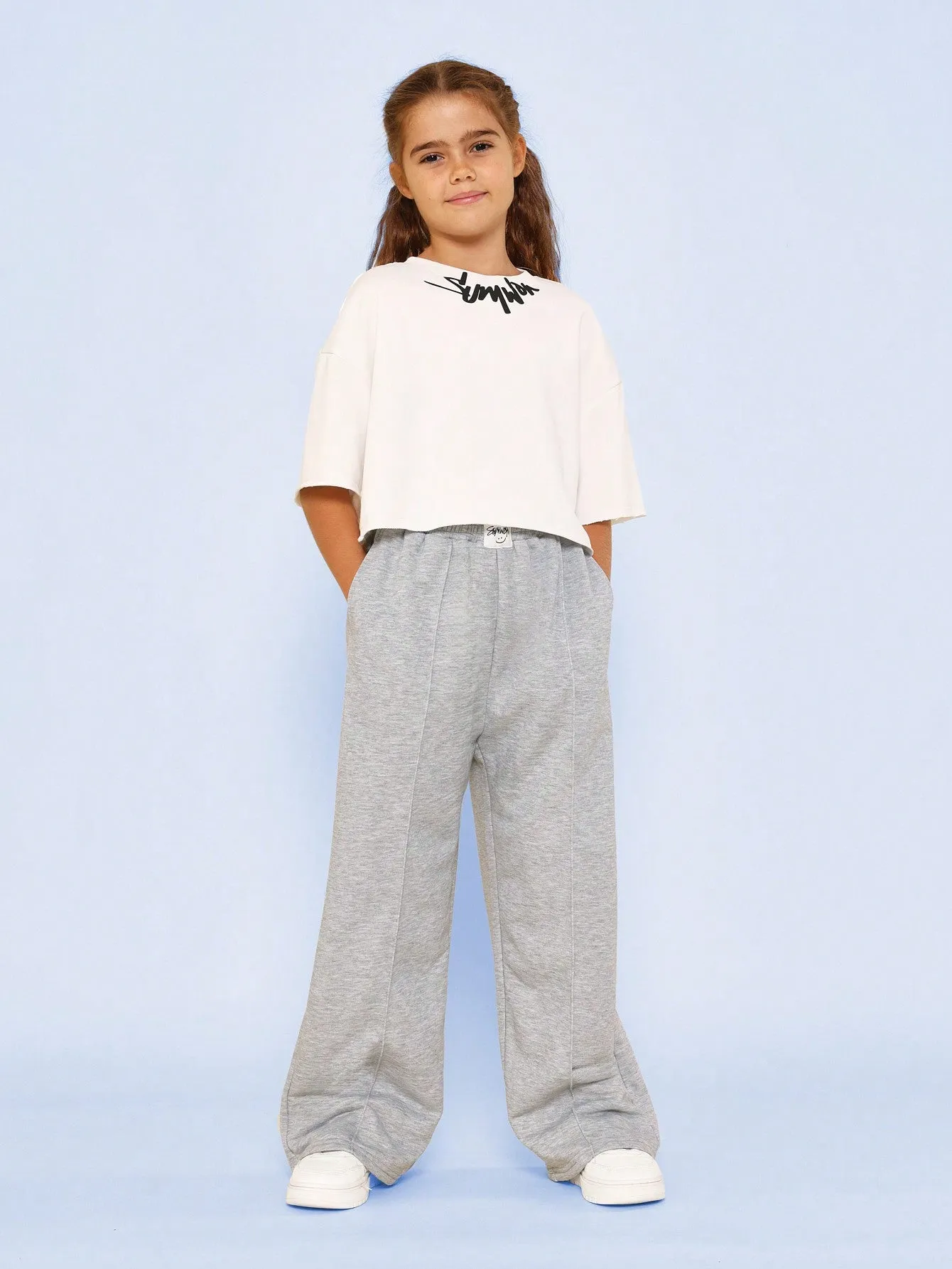 Tween Girls Crop Fit Raw Edge Graphic Print Tee And Pleated Jogger 2 Piece Set