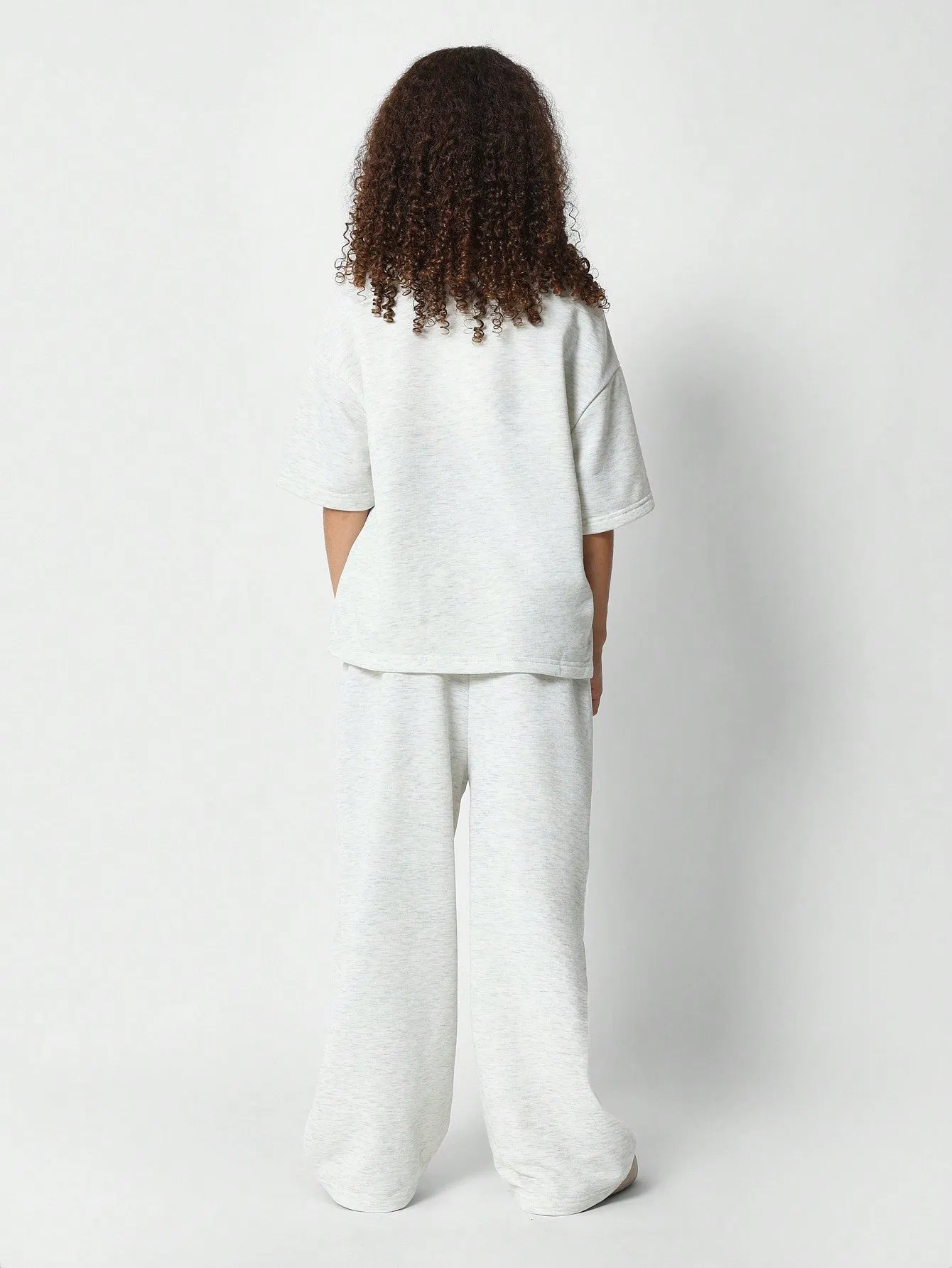 Tween Girls Oversized Fit Tee With Front Graphic And Jogger 2 Piece Set